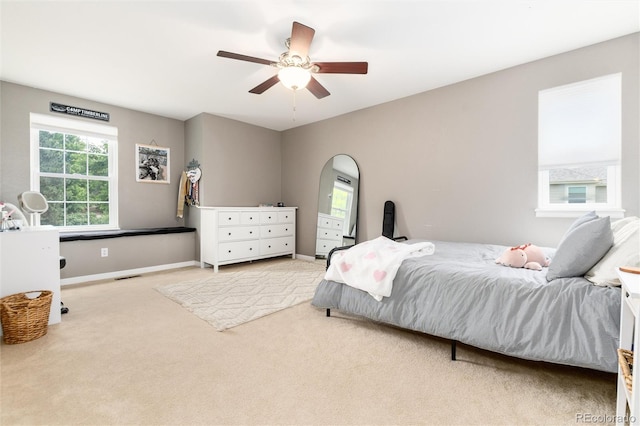2480 W Jamison Way, Littleton, CO 80120 - bedroom with carpet floors and a ceiling fan