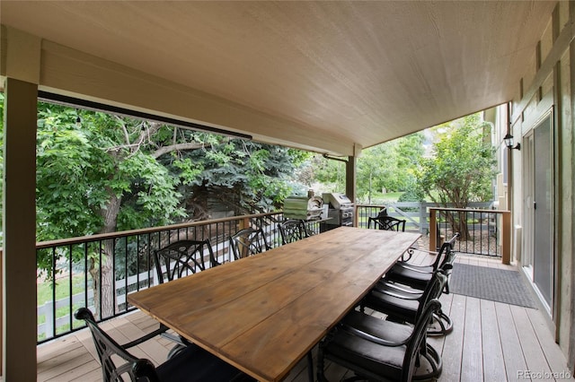 2480 W Jamison Way, Littleton, CO 80120 - wooden terrace featuring grilling area and outdoor dining space