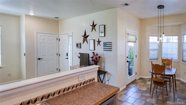 13708 Legend Trl Unit 101, Broomfield, CO 80023 - entrance foyer with baseboards and visible vents