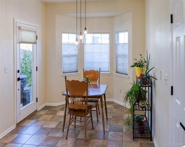 13708 Legend Trl Unit 101, Broomfield, CO 80023 - dining room with baseboards