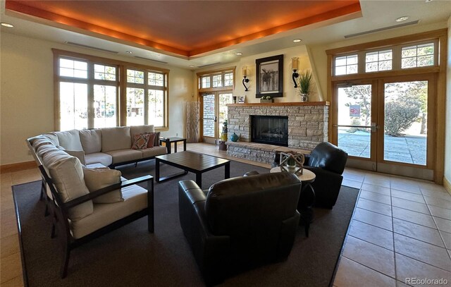 13708 Legend Trl Unit 101, Broomfield, CO 80023 - tiled living room featuring plenty of natural light, recessed lighting, french doors, and a raised ceiling