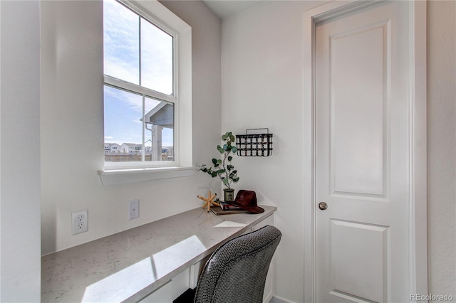 office area featuring built in study area