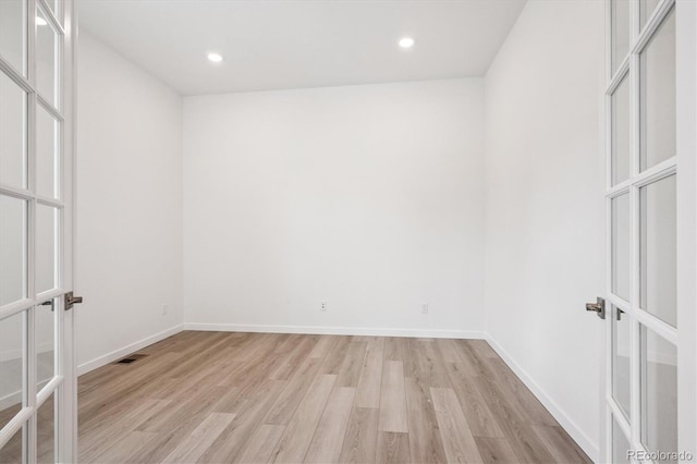 9197 Ironwood St, Highlands Ranch, CO 80129 - empty room featuring french doors, light wood-type flooring, and recessed lighting