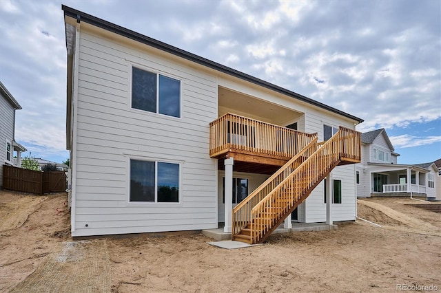 9197 Ironwood St, Highlands Ranch, CO 80129 - back of property with stairs and a deck