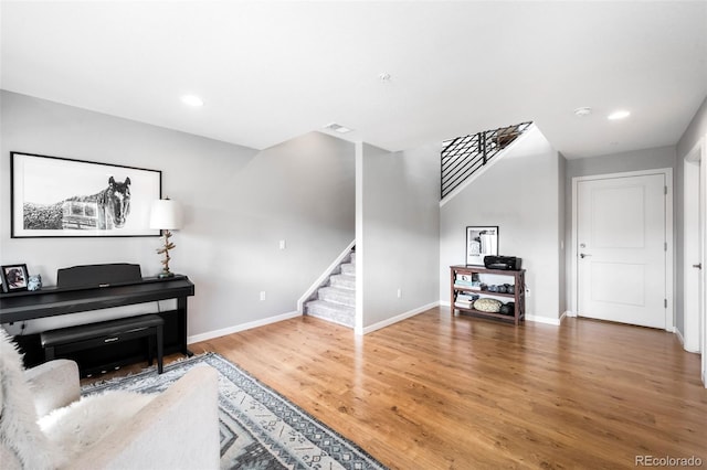 sitting room featuring hardwood / wood-style flooring