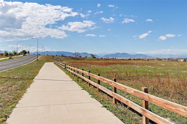 view of road featuring a rural view and a mountain view