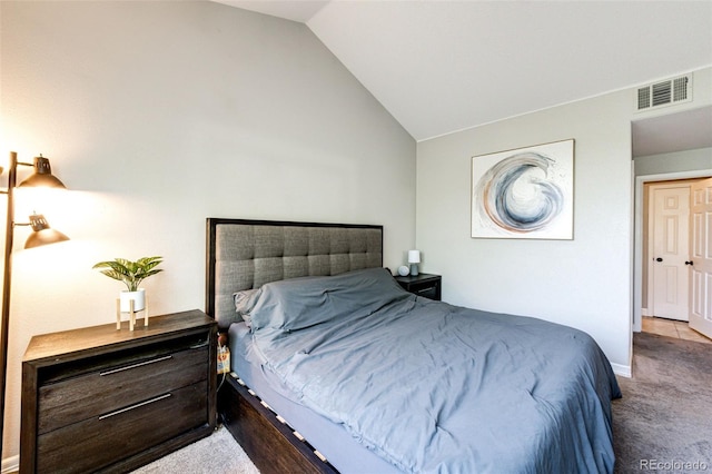 8500 E Jefferson Ave Unit 19B, Denver, CO 80237 - carpeted bedroom featuring lofted ceiling and baseboards