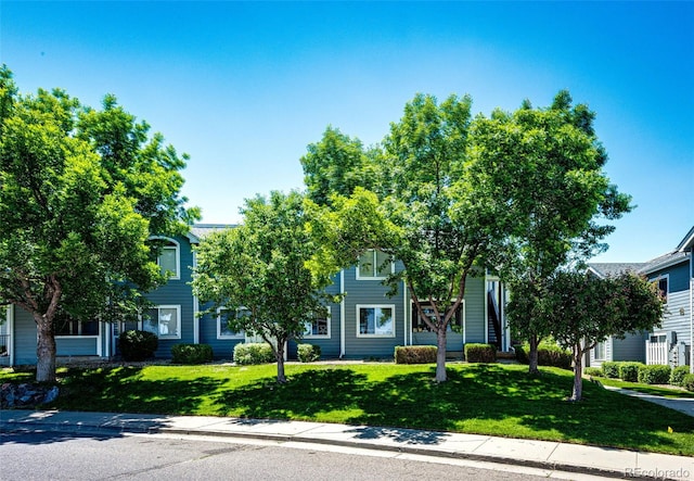 8500 E Jefferson Ave Unit 19B, Denver, CO 80237 - obstructed view of property with a front lawn
