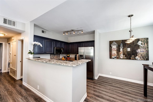 8500 E Jefferson Ave Unit 19B, Denver, CO 80237 - kitchen featuring appliances with stainless steel finishes, dark wood-type flooring, light stone counters, a peninsula, and baseboards