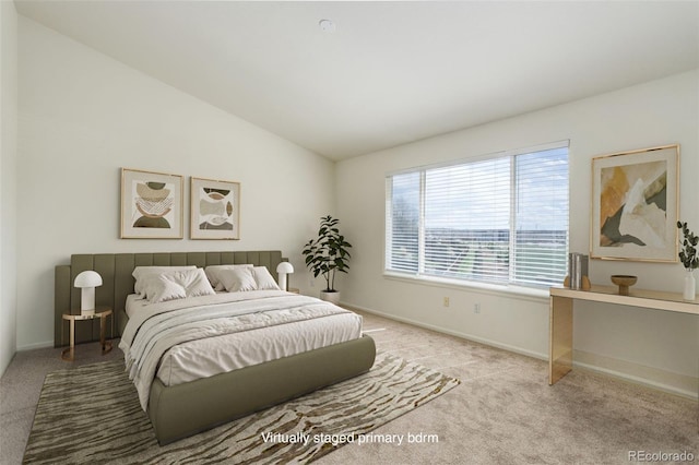 21968 E Princeton Dr, Aurora, CO 80018 - bedroom with carpet floors, lofted ceiling, and baseboards