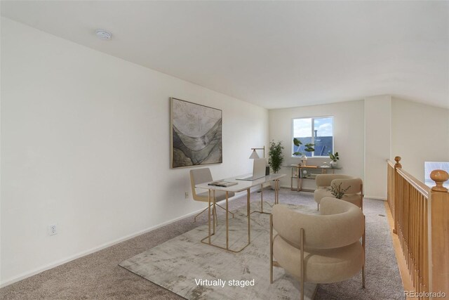 21968 E Princeton Dr, Aurora, CO 80018 - carpeted living area with baseboards