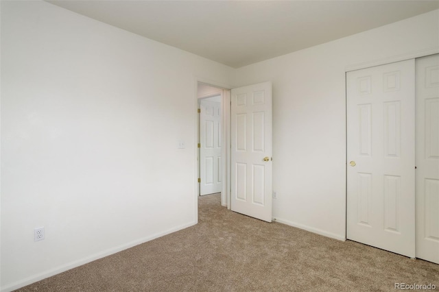 21968 E Princeton Dr, Aurora, CO 80018 - unfurnished bedroom with carpet and baseboards
