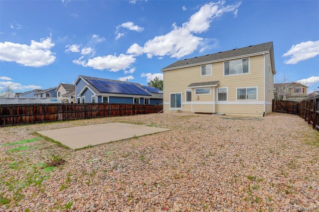 21968 E Princeton Dr, Aurora, CO 80018 - rear view of property with a patio and a fenced backyard