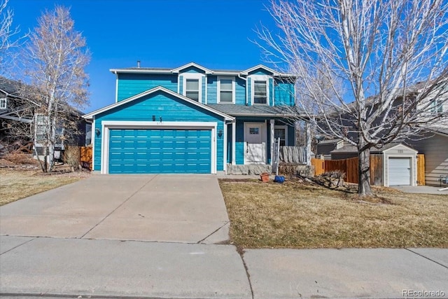 traditional-style house with driveway and an attached garage