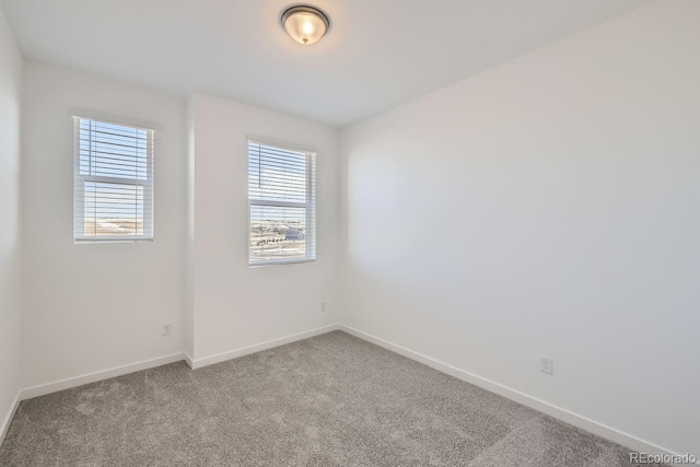 view of carpeted spare room