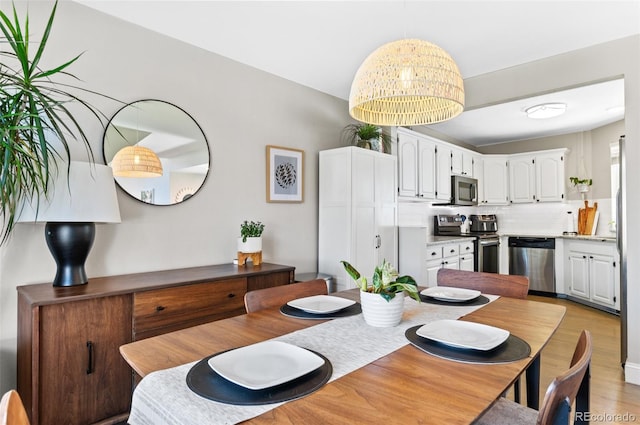 dining area featuring light hardwood / wood-style floors