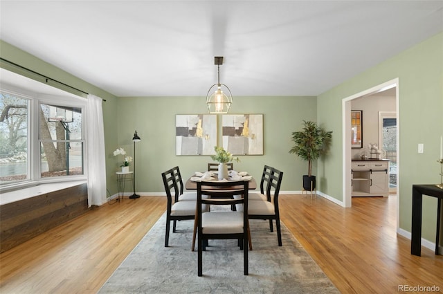 3190 Ward Ct, Wheat Ridge, CO 80215 - dining area with wood finished floors and baseboards