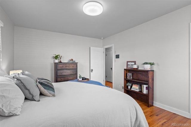 bedroom featuring hardwood / wood-style floors