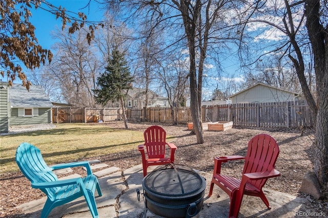 view of patio / terrace with an outdoor fire pit