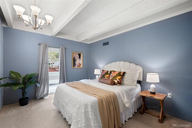 carpeted bedroom with a textured ceiling, an inviting chandelier, and beamed ceiling