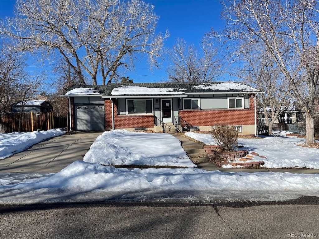 single story home featuring a garage