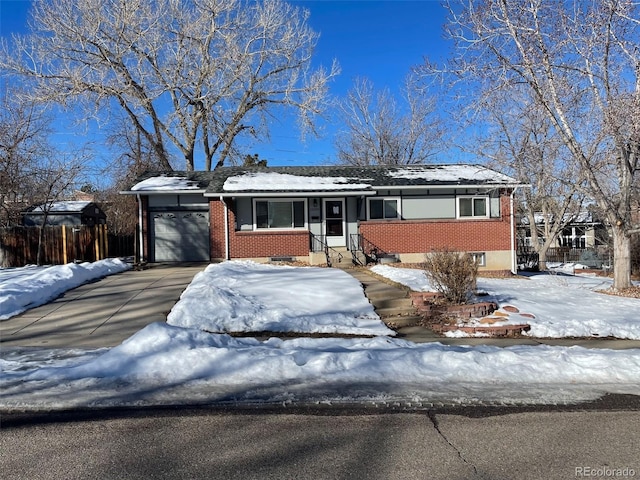 single story home featuring a garage