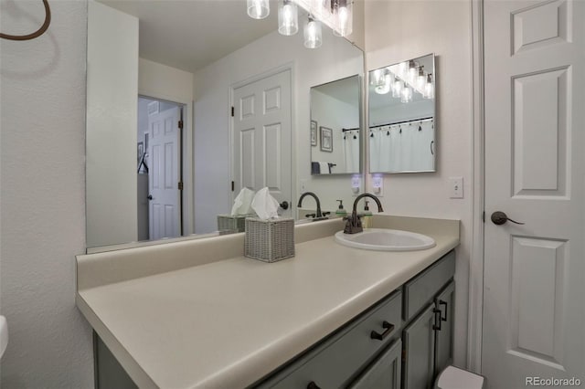 full bath featuring vanity