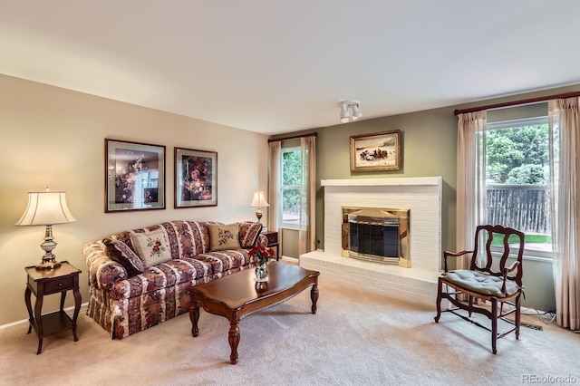 3544 Dyanna Dr, Thornton, CO 80241 - living area featuring carpet floors, plenty of natural light, and a brick fireplace