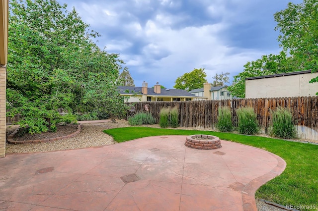 3544 Dyanna Dr, Thornton, CO 80241 - view of patio / terrace featuring a fire pit