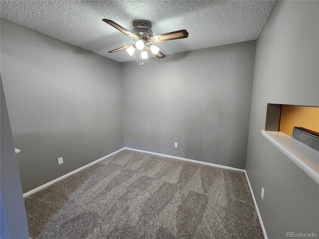 14499 E 1st Dr Unit A05, Aurora, CO 80011 - carpeted spare room featuring ceiling fan, a textured ceiling, and baseboards