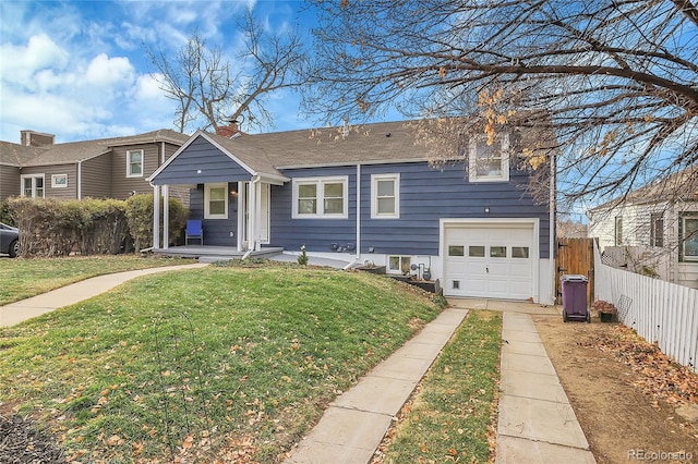 view of front facade featuring covered porch, a garage, and a front yard