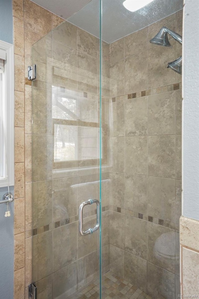 bathroom featuring walk in shower