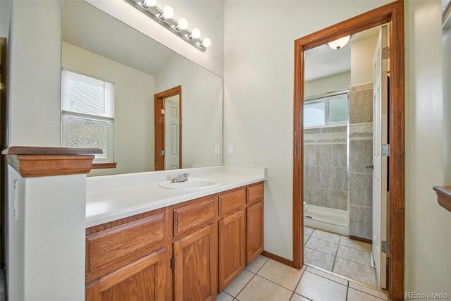 10106 Westside Cir, Littleton, CO 80125 - full bath with vanity, a stall shower, and tile patterned flooring