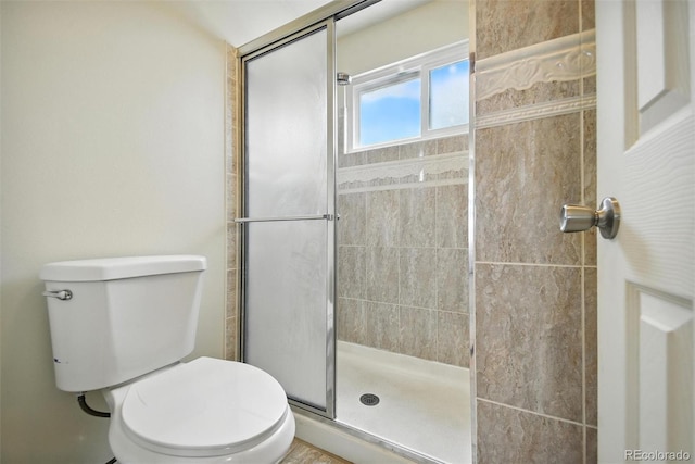 10106 Westside Cir, Littleton, CO 80125 - bathroom with toilet and a shower stall