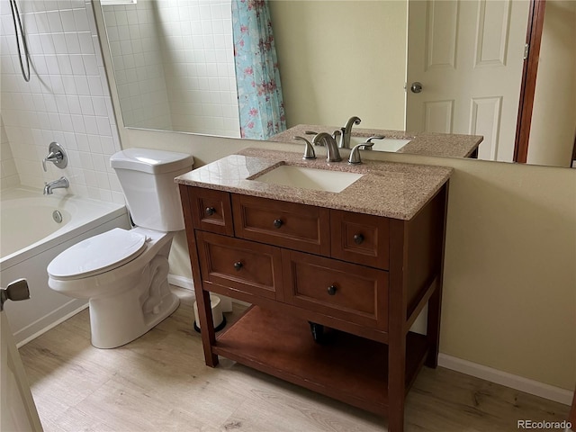 10106 Westside Cir, Littleton, CO 80125 - full bath with wood finished floors, vanity, and shower / bath combo