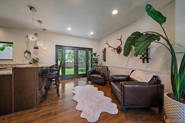 10701 Flagler Dr, Parker, CO 80134 - living room with french doors, dark wood-style flooring, and recessed lighting