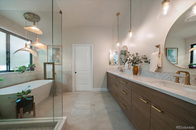 10701 Flagler Dr, Parker, CO 80134 - full bath with double vanity, a freestanding bath, lofted ceiling, and a shower with shower door