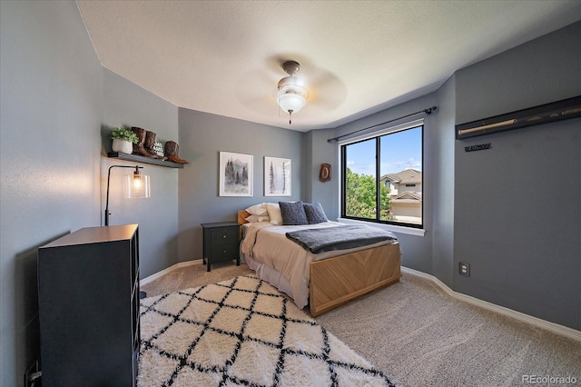 10701 Flagler Dr, Parker, CO 80134 - bedroom featuring light carpet, baseboards, and ceiling fan