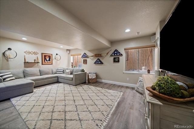10701 Flagler Dr, Parker, CO 80134 - living area with baseboards, wood finished floors, and recessed lighting