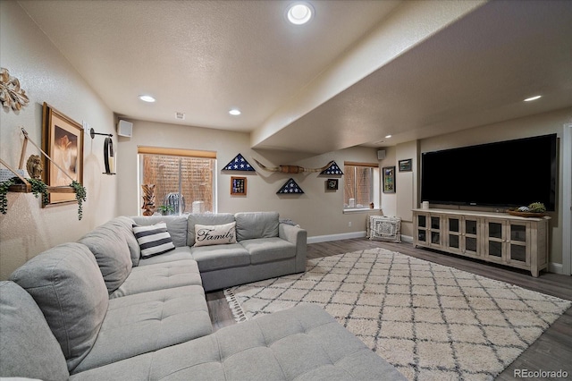 10701 Flagler Dr, Parker, CO 80134 - living area featuring wood finished floors, baseboards, and recessed lighting