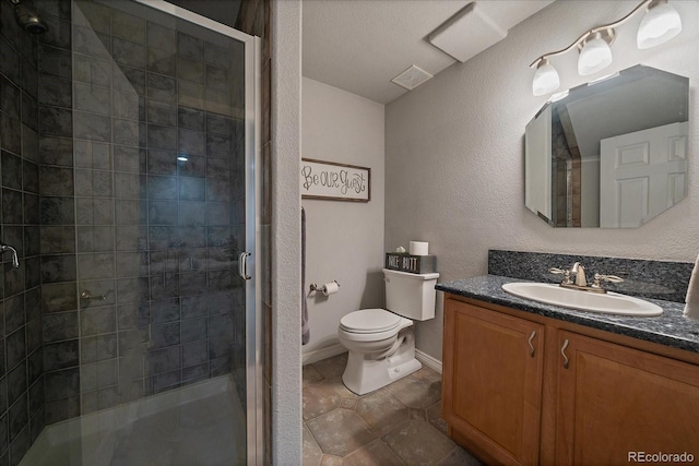 10701 Flagler Dr, Parker, CO 80134 - bathroom with vanity, a shower stall, toilet, and baseboards