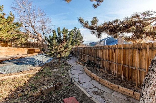 view of yard featuring a fenced backyard