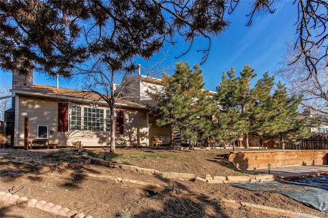 view of front of home with a chimney