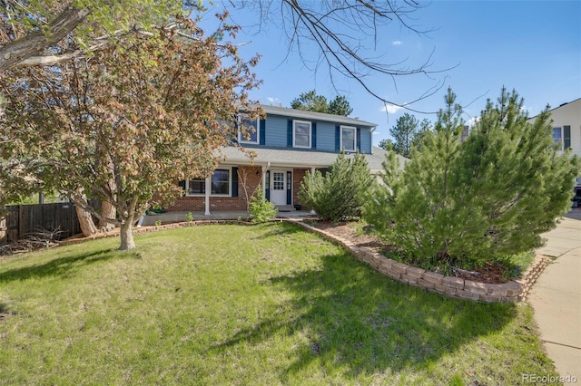 9926 W Nova Pl, Littleton, CO 80127 - traditional home featuring brick siding