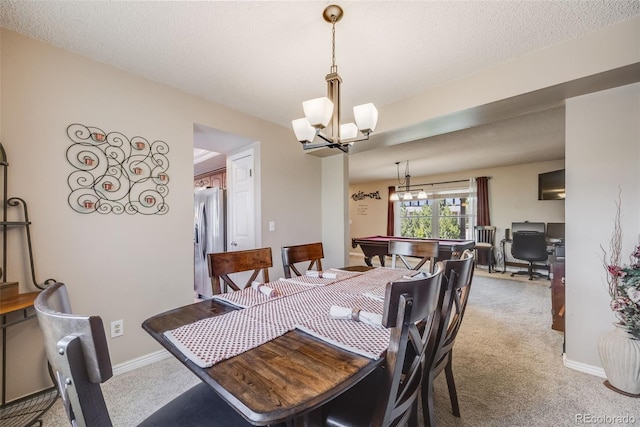 9926 W Nova Pl, Littleton, CO 80127 - dining space featuring light colored carpet and a chandelier