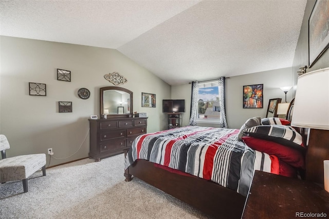 9926 W Nova Pl, Littleton, CO 80127 - carpeted bedroom featuring vaulted ceiling and baseboards