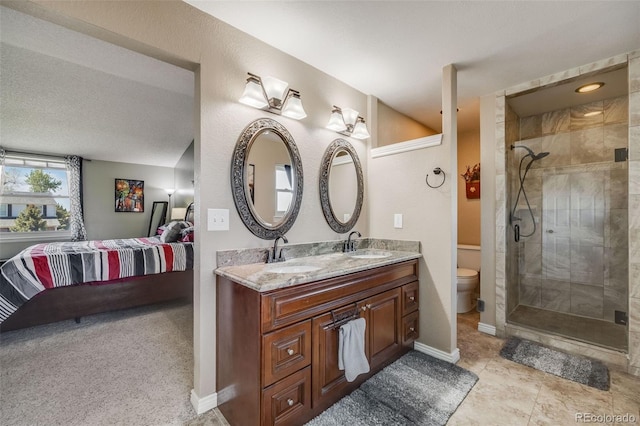 9926 W Nova Pl, Littleton, CO 80127 - ensuite bathroom with double vanity and a shower stall