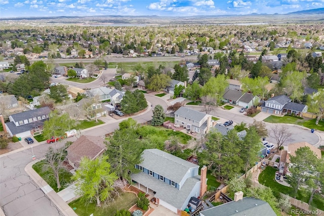 9926 W Nova Pl, Littleton, CO 80127 - aerial perspective of suburban area featuring a mountainous background