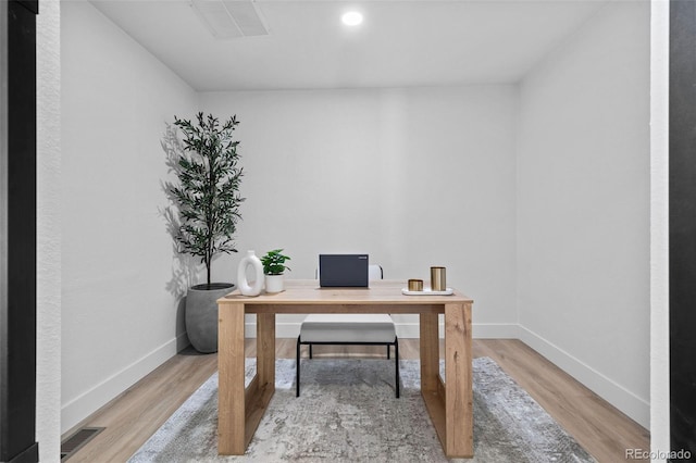 office with hardwood / wood-style floors