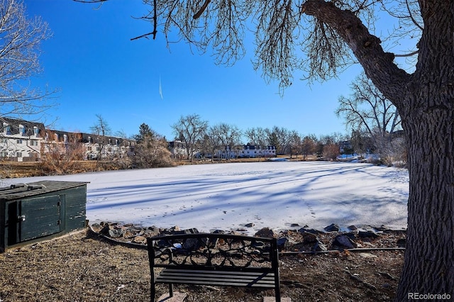 view of yard layered in snow